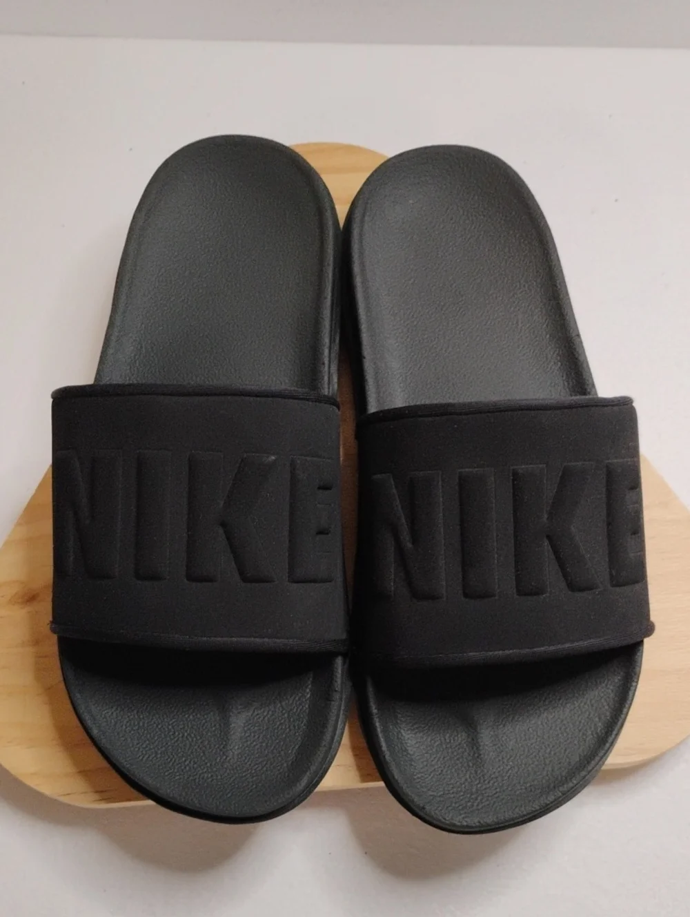 Nike Black Slide Sandals with Embossed NIKE Strap